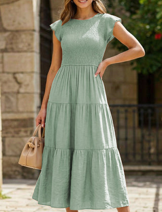 Light green solid color cross-border sleeved dress by Christine Brewer featuring a stylish, comfortable design.