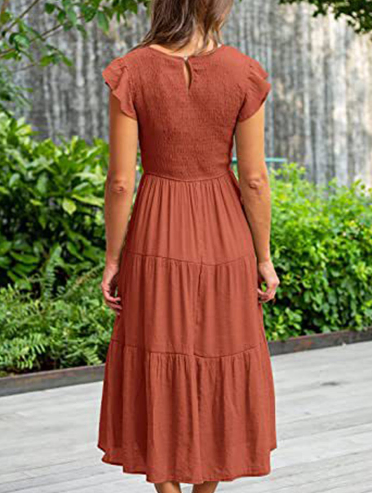 White sleeved dress by Christine Brewer featuring a solid color design and elegant cross-border style.