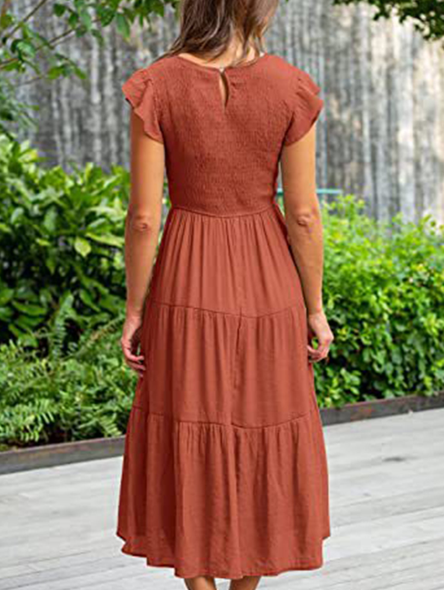 White sleeved dress by Christine Brewer featuring a solid color design and elegant cross-border style.