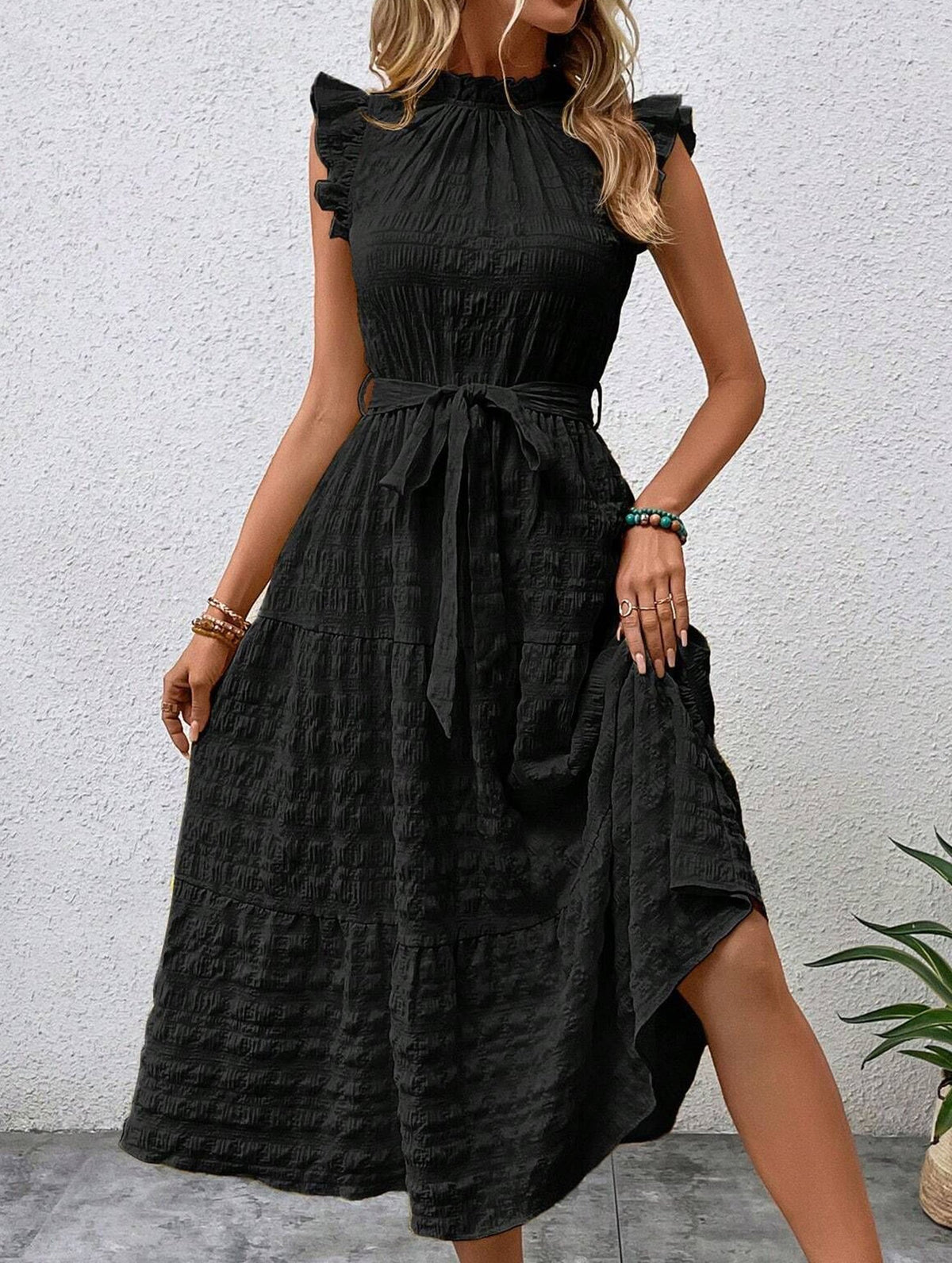 Black ruffled flutter sleeve tie textured dress by Christine Brewer, featuring a stylish design and elegant silhouette.