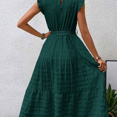 White ruffled flutter sleeve tie textured dress by Christine Brewer, featuring a stylish design and elegant silhouette.