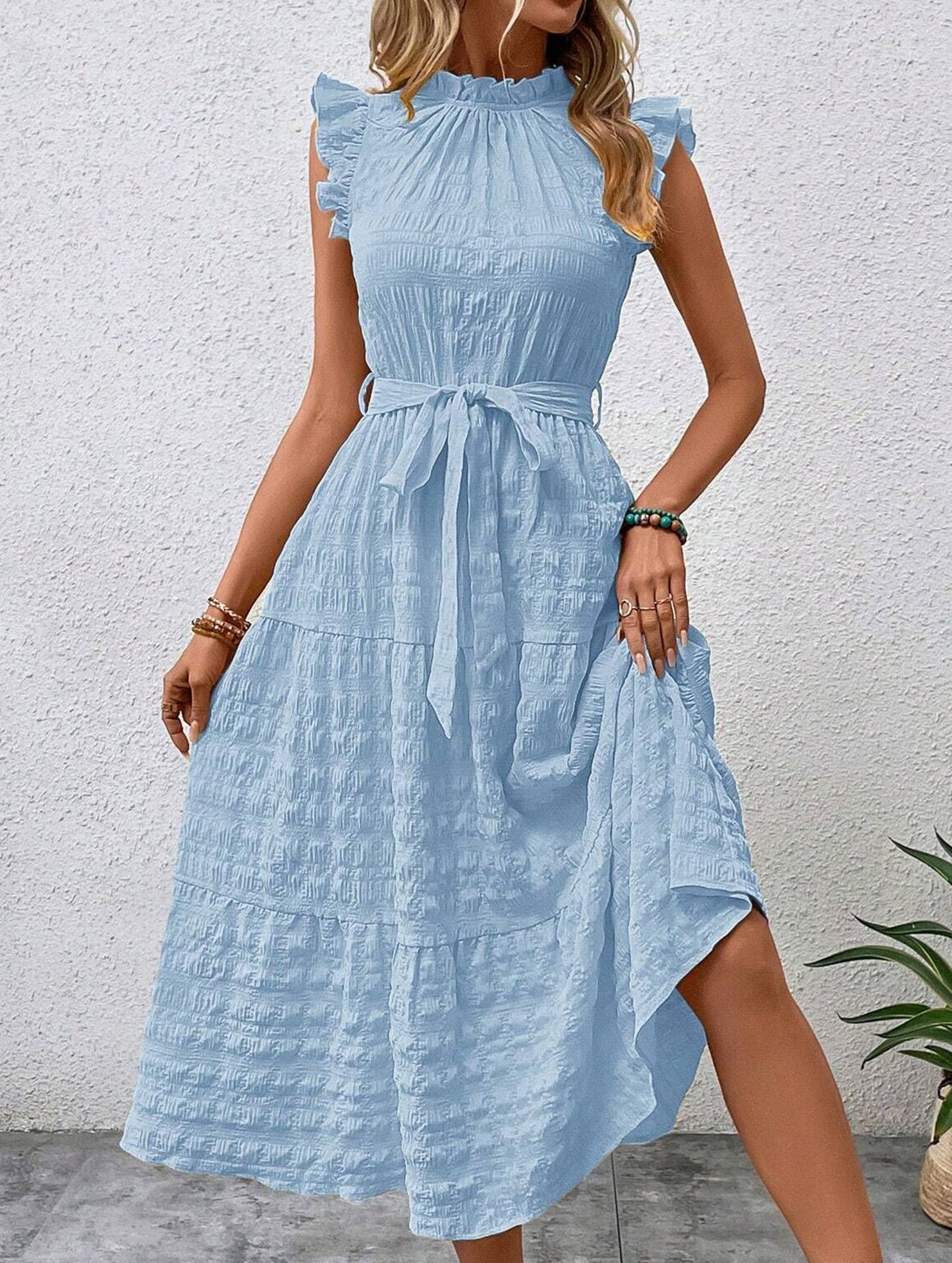 Light blue ruffled flutter sleeve tie textured dress by Christine Brewer, featuring a stylish and feminine design.