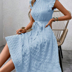 White ruffled flutter sleeve tie textured dress by Christine Brewer, featuring a stylish design and lightweight fabric.