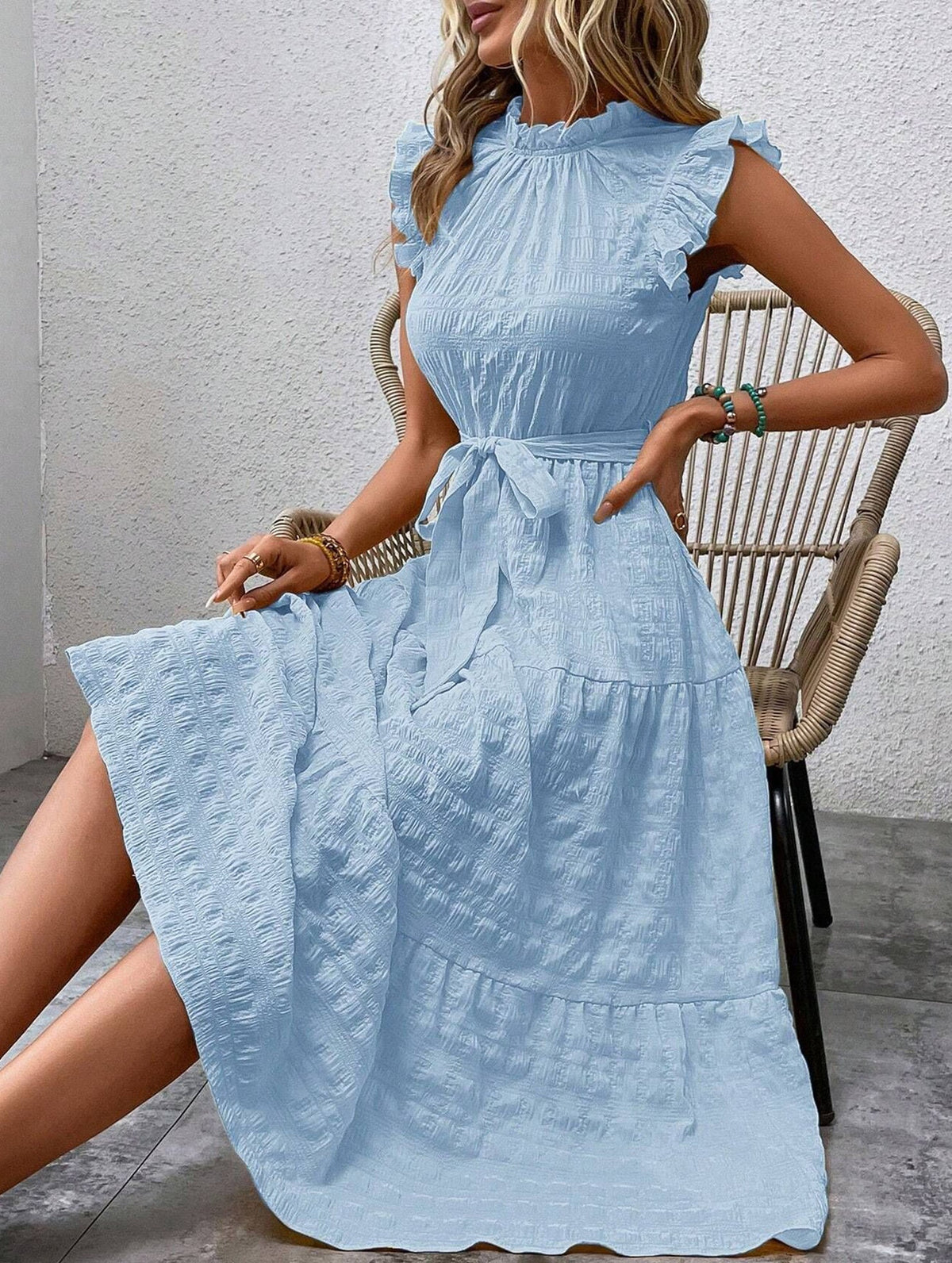 White ruffled flutter sleeve tie textured dress by Christine Brewer, featuring a stylish design and lightweight fabric.