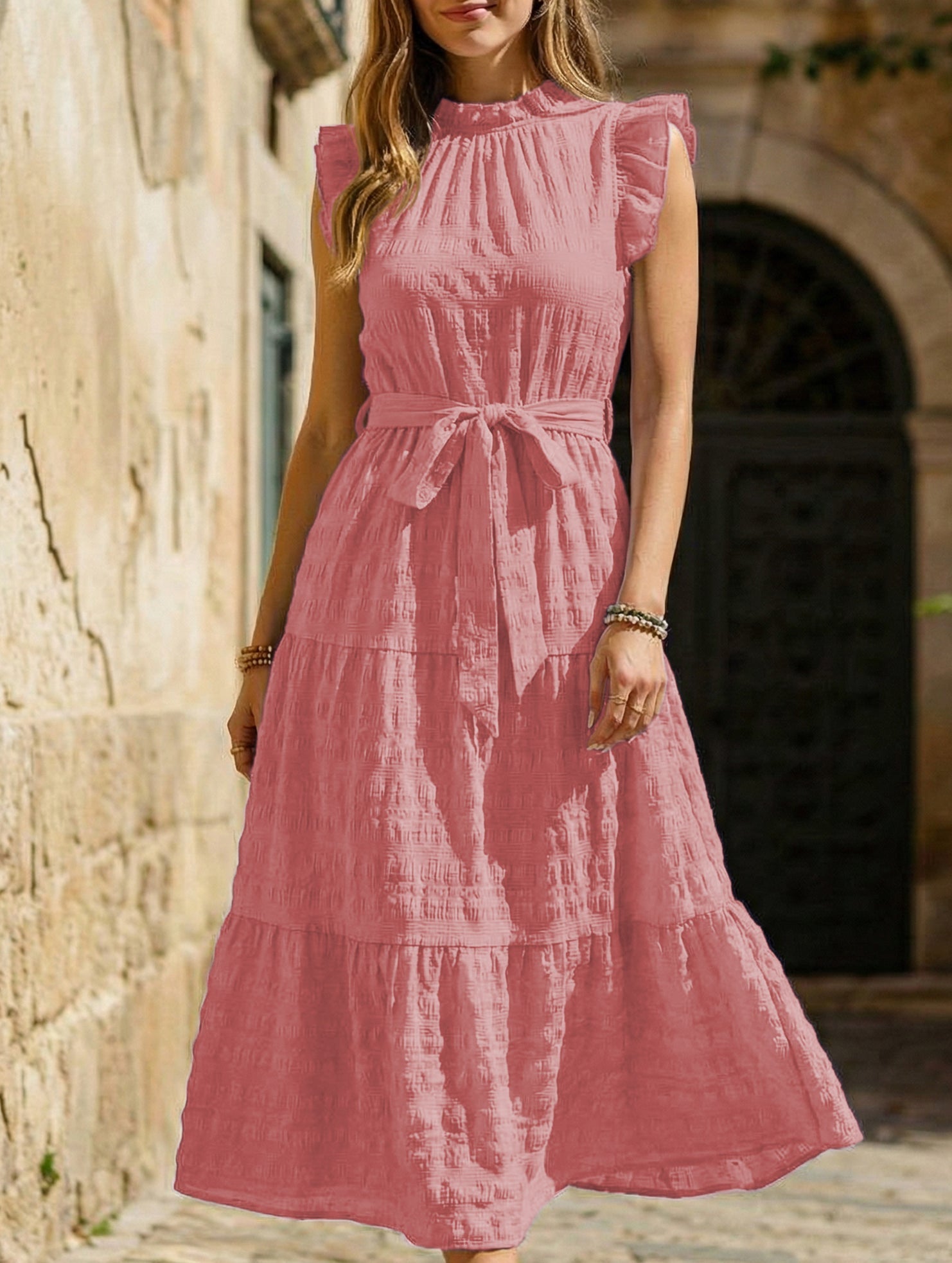 White ruffled flutter sleeve tie-textured dress by Christine Brewer, featuring a feminine silhouette and delicate fabric details.