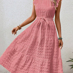 White ruffled flutter sleeve tie textured dress by Christine Brewer, featuring a stylish design perfect for summer or casual wear.