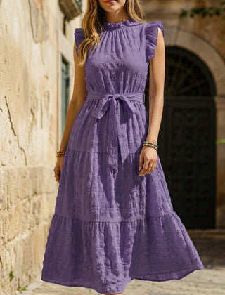 Purple ruffled flutter sleeve tie textured dress by Christine Brewer, featuring a stylish and elegant design.