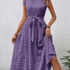 White ruffled flutter sleeve tie textured dress by Christine Brewer, featuring a stylish and elegant design.