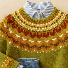 Warm Nordic sweater for women by Christine Brewer featuring a cozy, stylish design with a high neckline and intricate knit pattern.