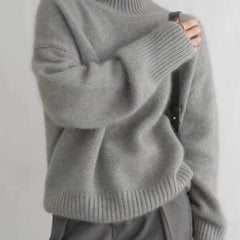 Christine Brewer Kennedy high neck women's sweater in cozy 100% pure wool, perfect for fall and winter, in a chunky knit design.