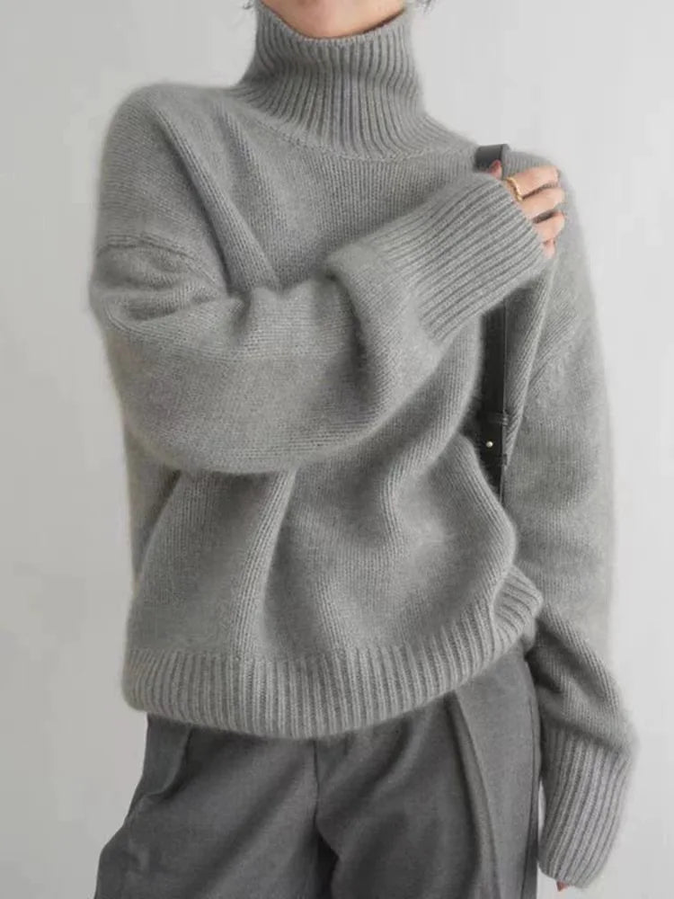 Christine Brewer Kennedy high neck women's sweater in cozy 100% pure wool, perfect for fall and winter, in a chunky knit design.