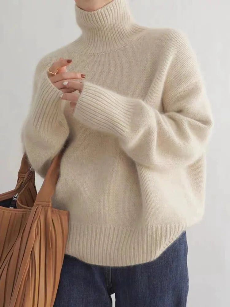 Christine Brewer Kennedy high neck women's sweater in soft cashmere, cozy winter knit, 2023 autumn and winter collection.