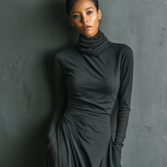 Christine Brewer cotton turtleneck maxi dress, elegant evening dress in soft fabric, featuring a fitted bodice and long sleeves.