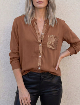 Dark brown summer blouse for women with V-neck and denim button front, featuring a casual, stylish top by Christine Brewer.