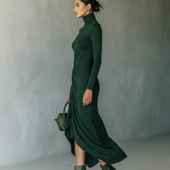 Dark green knit wrap midi dress for women by Christine Brewer, featuring a fitted waist and flowing skirt.