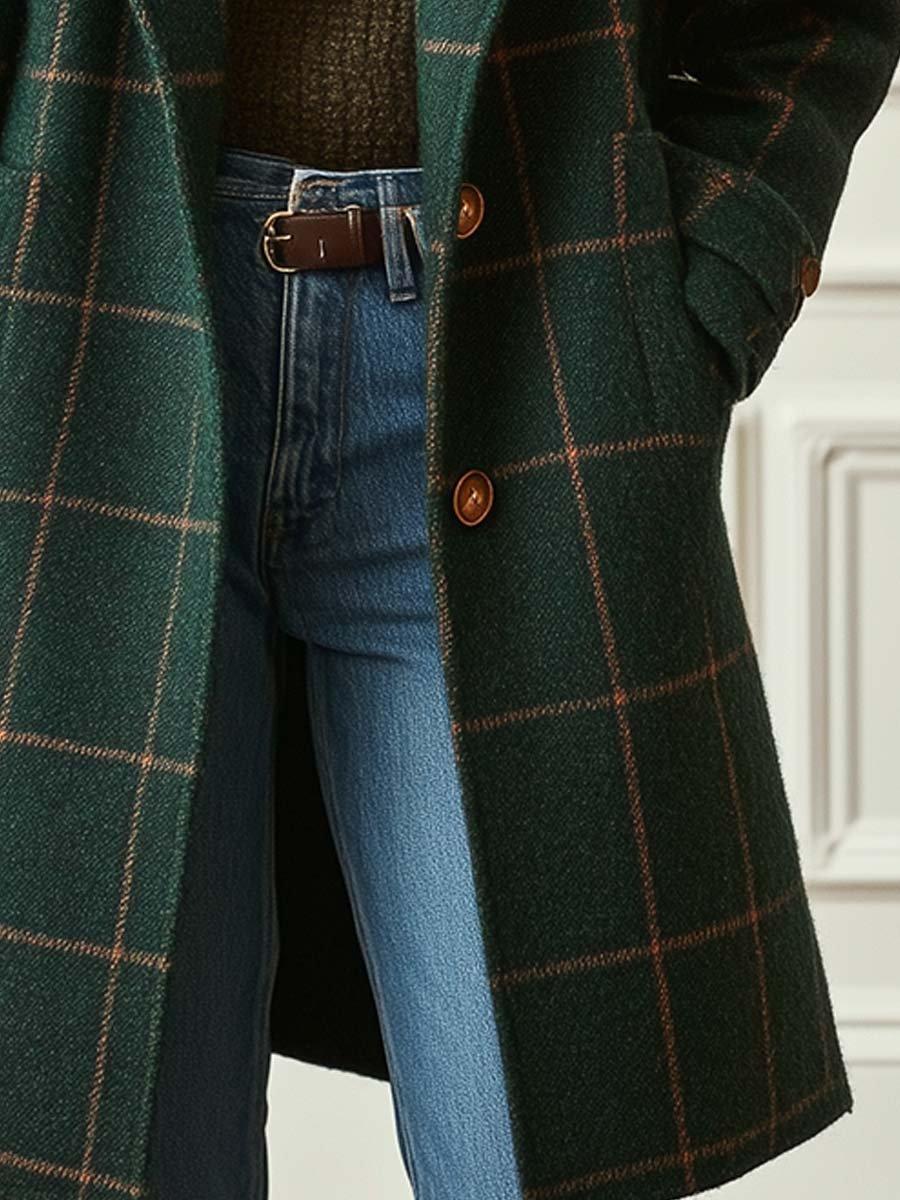 Green checkered women's long coat by Christine Brewer with two-button closure, perfect for elegant winter style.