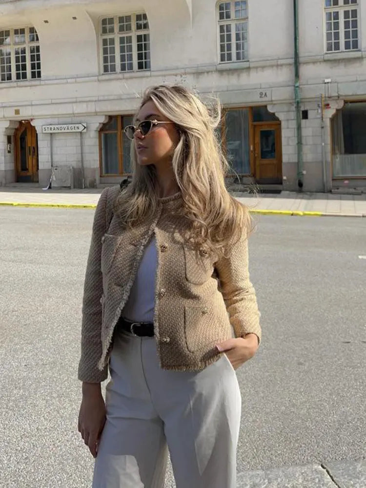 Charlotte short tweed blazer jacket for women by Christine Brewer, featuring buttons and a tailored fit in a classic tweed fabric.