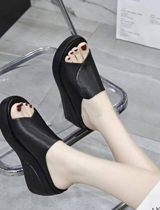 Comfortable Eliza orthopedic slip-on wedge sandals for women by Christine Brewer, featuring supportive design and casual style.