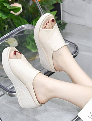 Comfortable Christine Brewer Eliza orthopedic slip-on wedge sandals for women, featuring a stylish design and supportive heel.