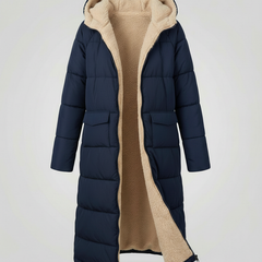 Christine Brewer Iris long puffer jacket for women in blue and navy, featuring a quilted design and warm, stylish insulation.