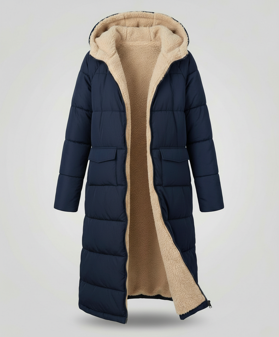 Christine Brewer Iris long puffer jacket for women in blue and navy, featuring a quilted design and warm, stylish insulation.