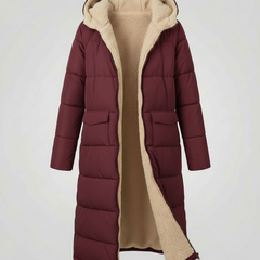 Christine Brewer Iris long burgundy puffer jacket for women, stylish and warm with a quilted design and hood.