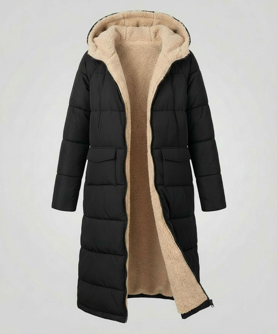 Long puffer jacket for women by Christine Brewer, featuring a floral button design and a stylish, insulated outerwear look.