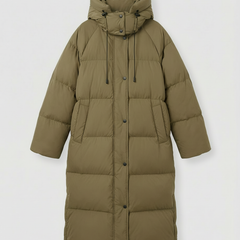 Long puffer jacket for women by Christine Brewer, featuring a stylish, insulated design ideal for cold weather.