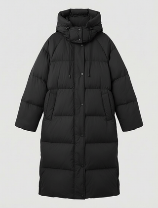 Long puffer jacket for women by Christine Brewer, featuring a stylish, insulated design perfect for cold weather.