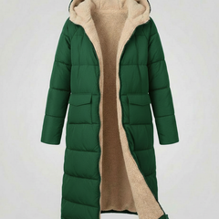 Christine Brewer Iris long green puffer jacket for women, displayed on a mannequin, featuring a stylish winter coat design.