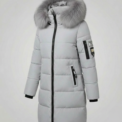Christina Brewer Sadie women's cosy puffer jacket with front pockets, shown with zipper detail on a neutral background.