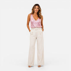 Women's sequin V-neck top by Christine Brewer, perfect for party and evening wear, featuring shimmering sequins and a stylish design.