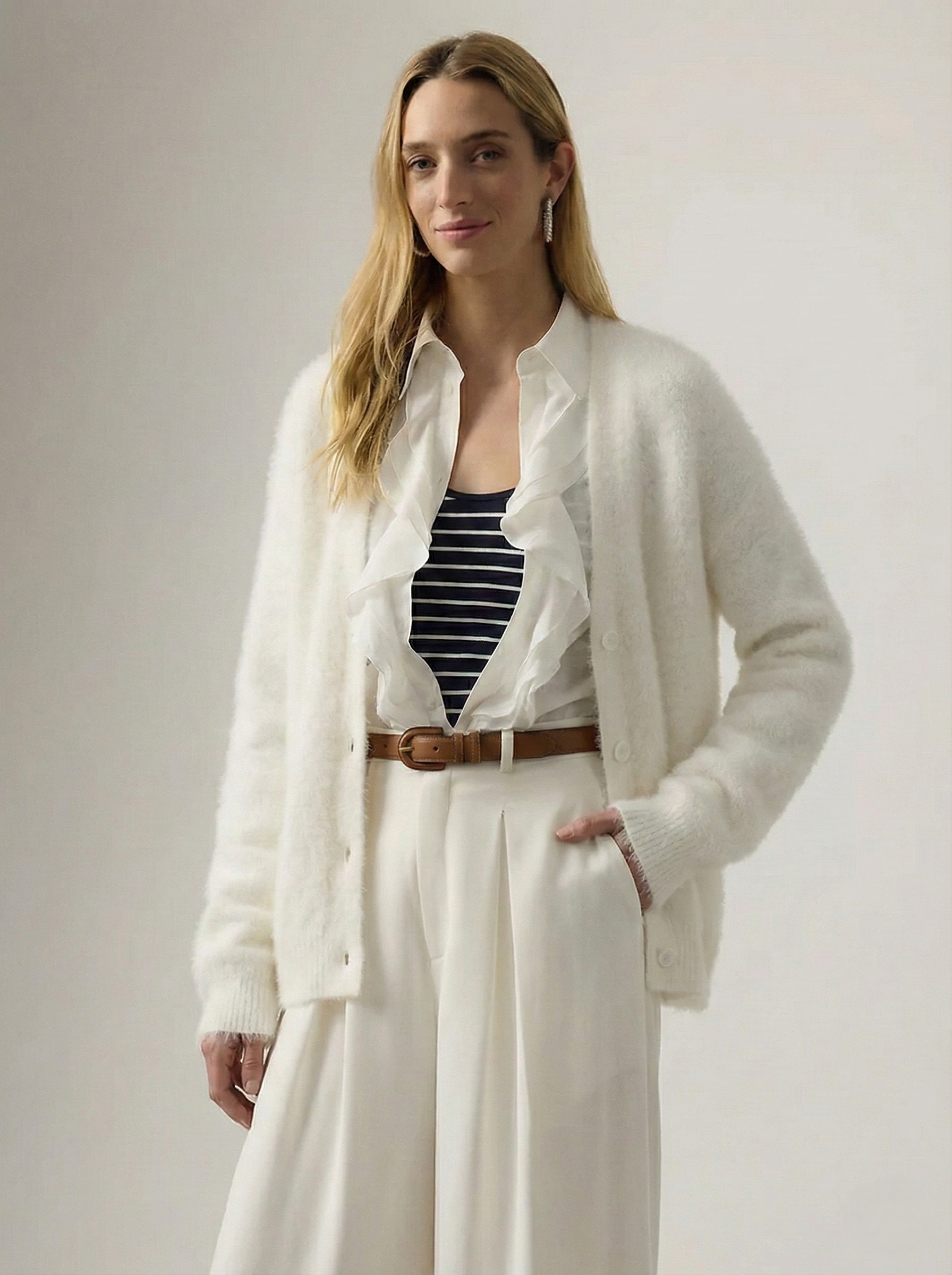 Oversized cashmere cardigan for women by Christine Brewer, shown in a cozy, draped fit with soft, luxurious texture.