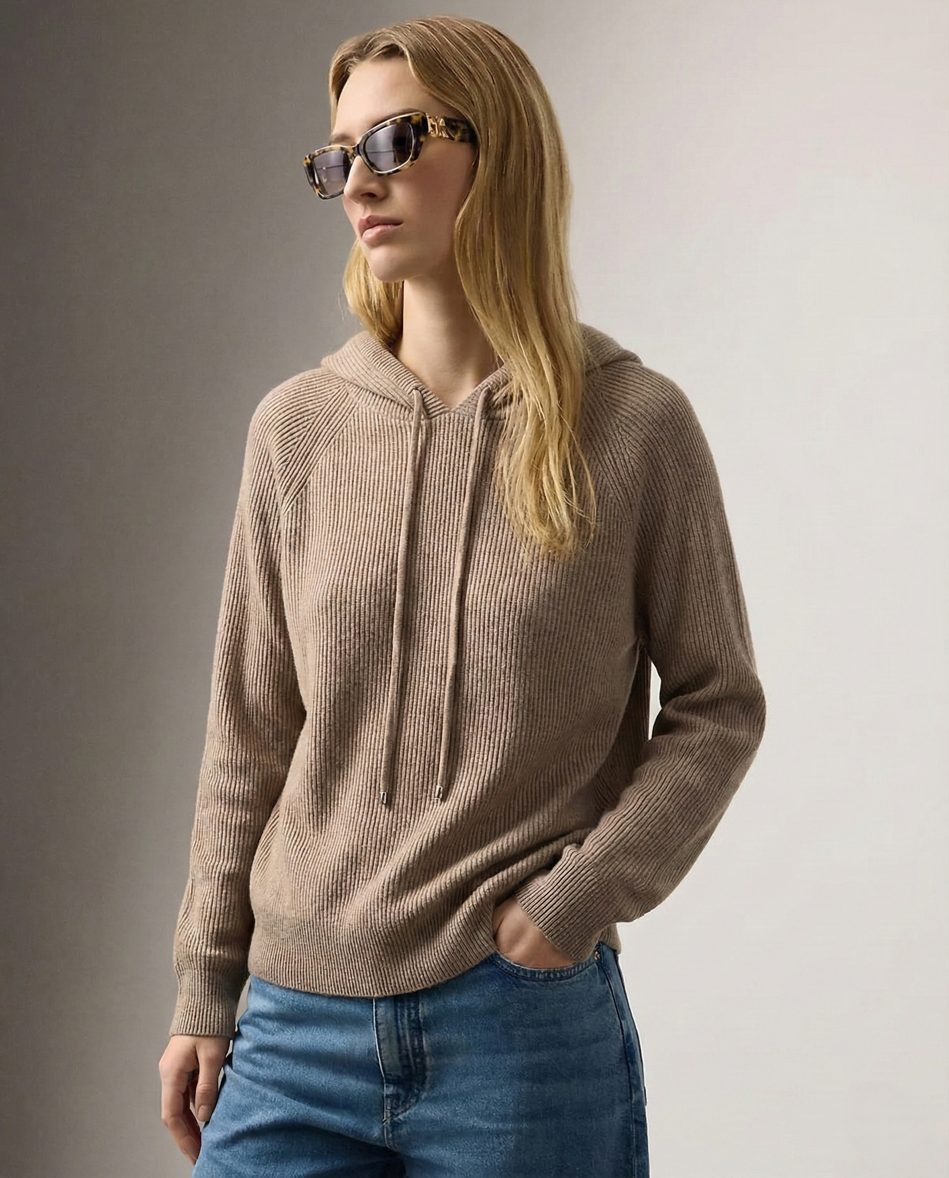Women’s cashmere hoodie from Christine Brewer's Claudia collection, soft, cozy, with a relaxed fit and ribbed cuffs.
