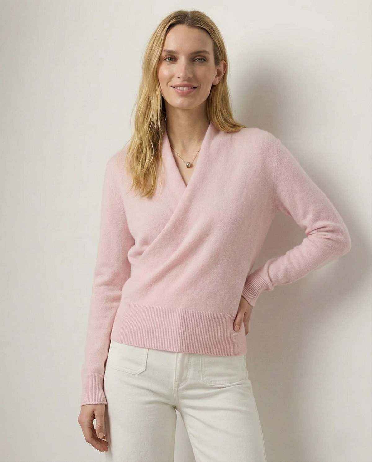 Women’s beige cashmere sweater by Christine Brewer, featuring a cozy, soft knit and a classic fit for stylish comfort.