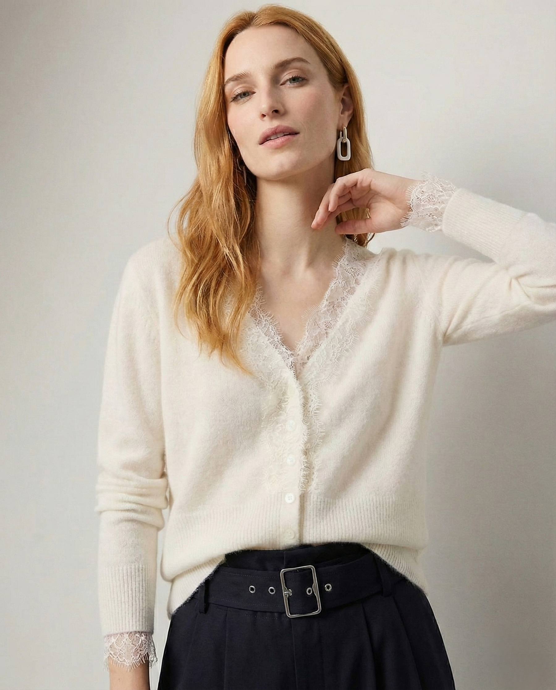 Elegant Elsa cashmere cardigan for women by Christine Brewer, shown in a soft, cozy knit with a relaxed fit and button closure.
