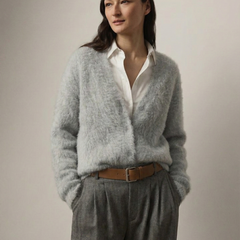Oversized cashmere cardigan for women by Christine Brewer, featuring a cozy, soft knit in a relaxed fit with front pockets.
