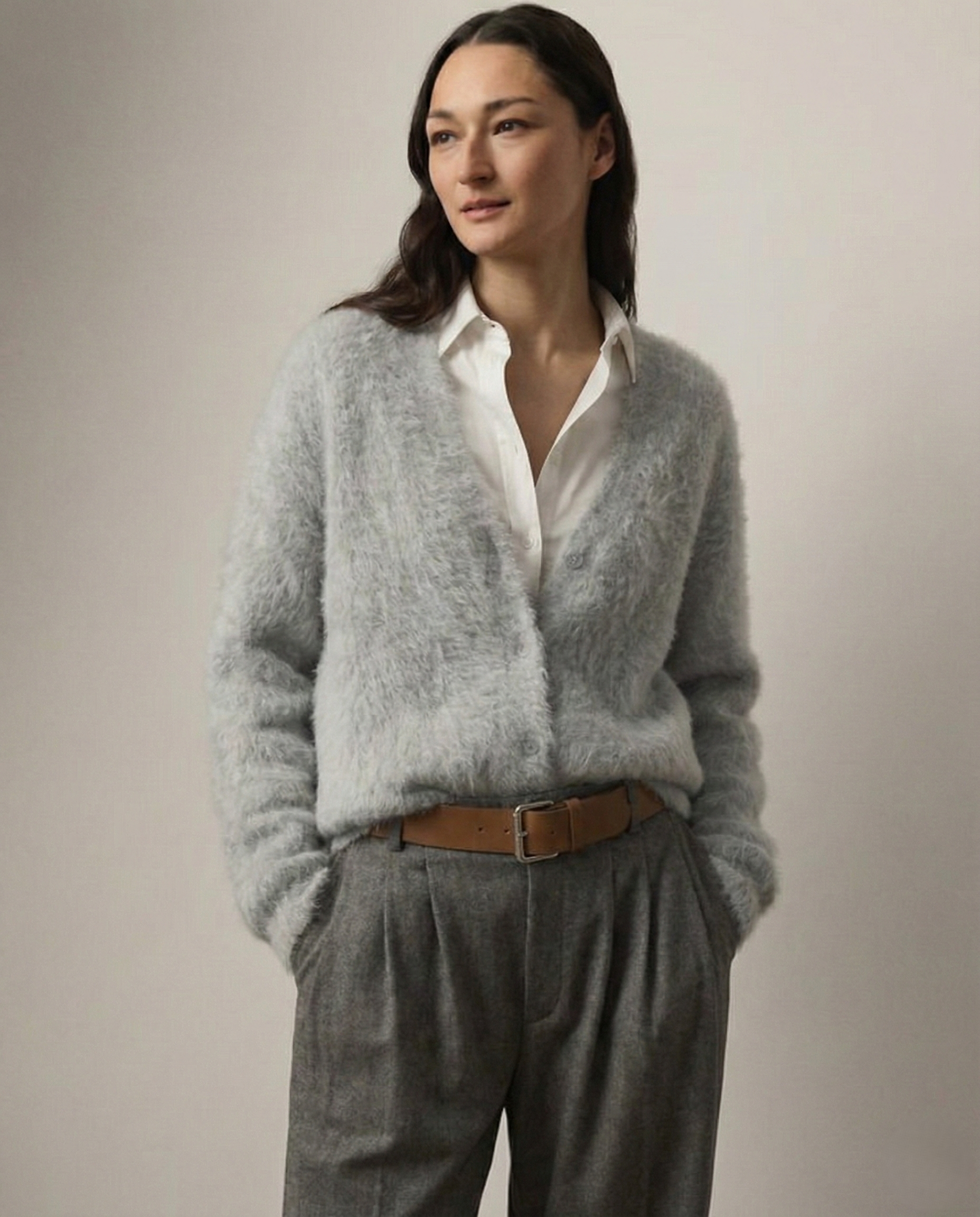 Oversized cashmere cardigan for women by Christine Brewer, featuring a cozy, soft knit in a relaxed fit with front pockets.