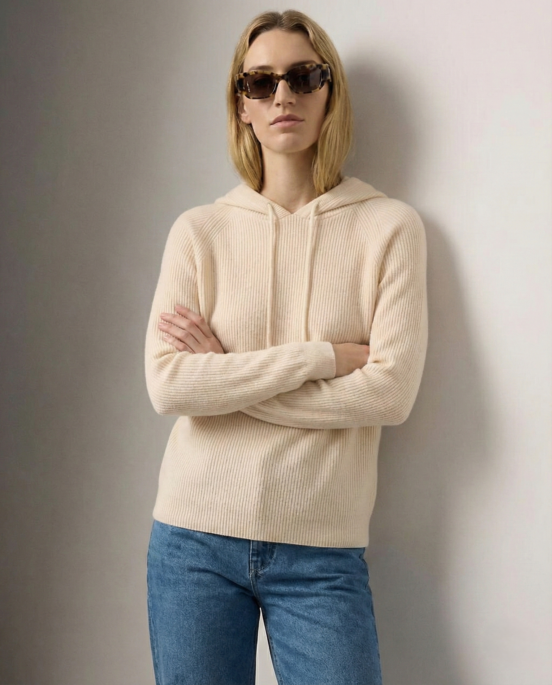Cream-colored Claudia cashmere hoodie for women by Christine Brewer, showing a cozy, soft fabric with a relaxed fit.