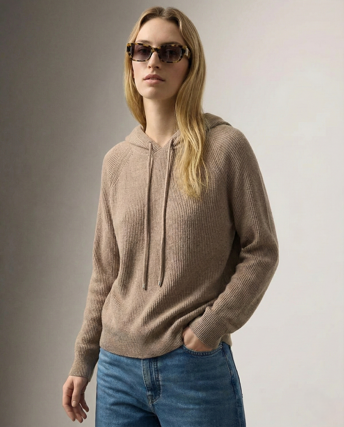 Women’s Claudia cashmere hoodie by Christine Brewer, featuring a soft, cozy fit and stylish design in a neutral color.