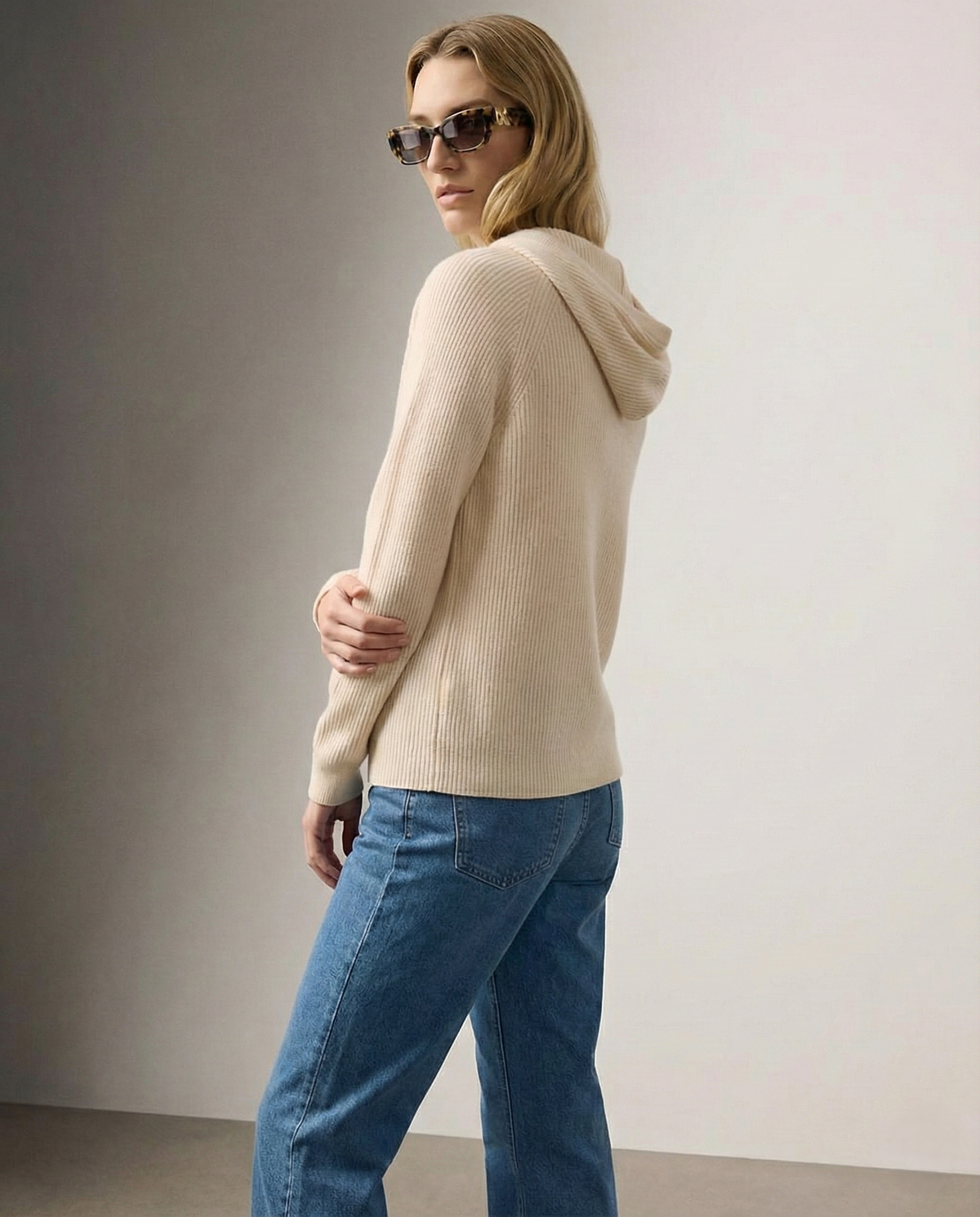 Claudia cashmere hoodie for women by Christine Brewer, soft beige hoodie with a relaxed fit and drawstring hood.