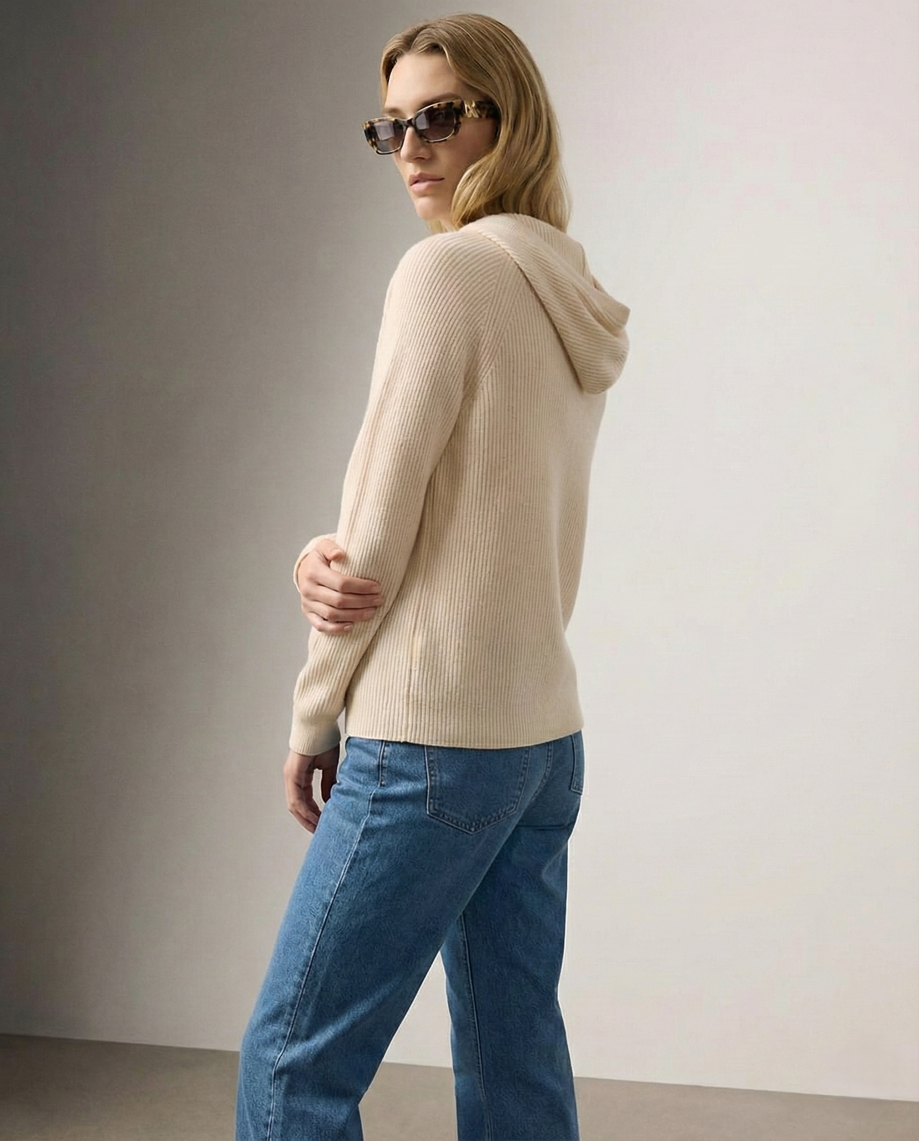 Claudia cashmere hoodie for women by Christine Brewer, soft beige hoodie with a relaxed fit and drawstring hood.