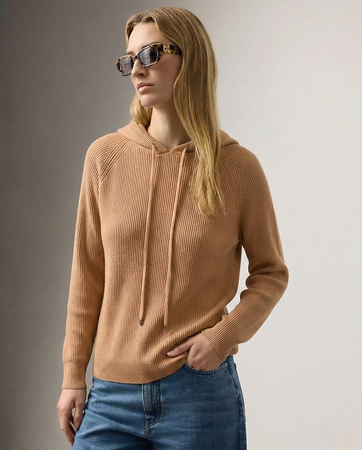 Cream cashmere hoodie for women by Christine Brewer, featuring a cozy, soft knit with a relaxed fit and stylish hood.