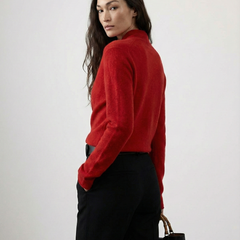 Cream-colored Dawn cashmere sweater for women by Christine Brewer, featuring a cozy, soft knit design.