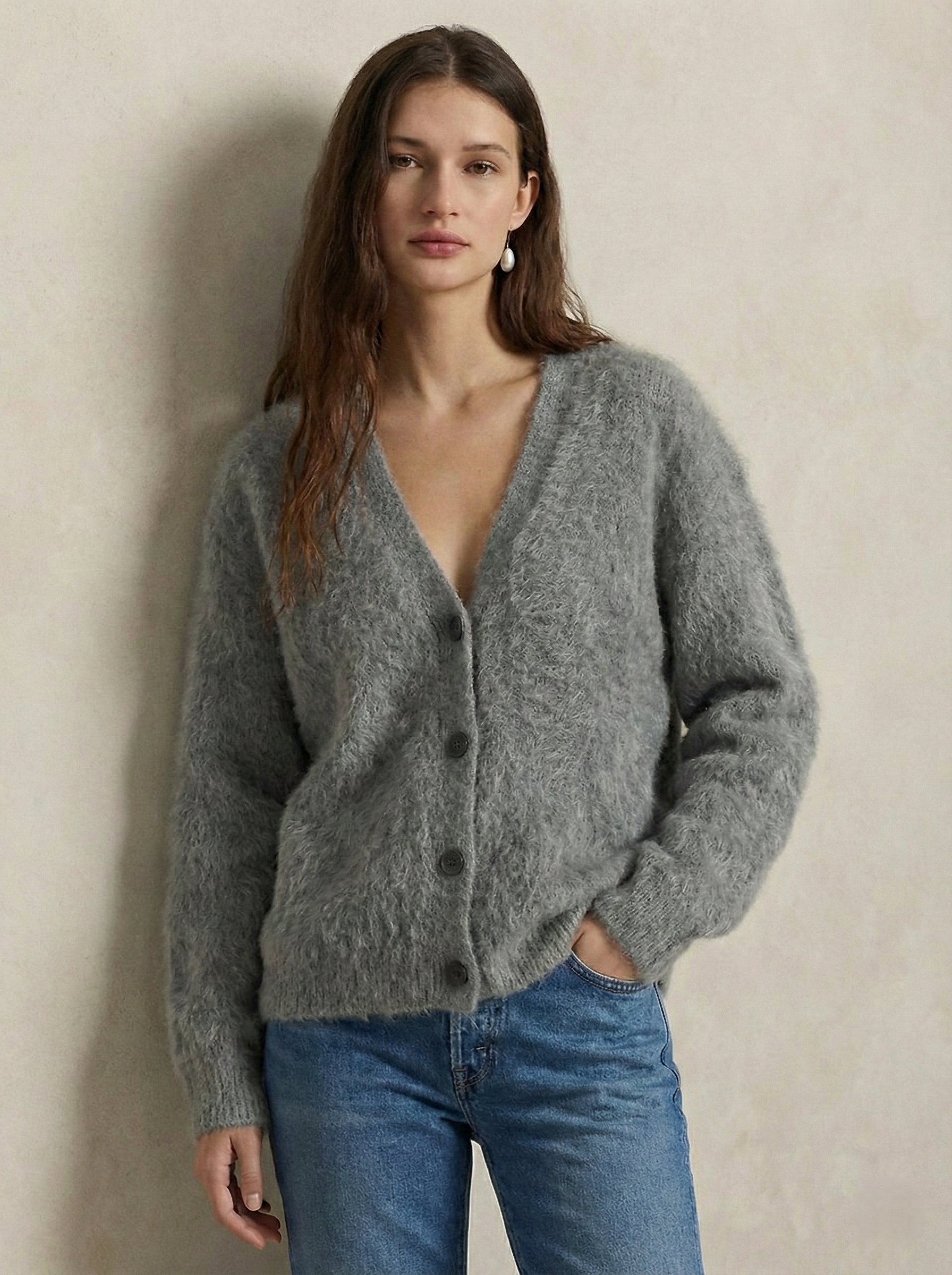 Oversized cashmere cardigan for women in soft neutral tones, featuring a relaxed fit and cozy knit texture by Christine Brewer.