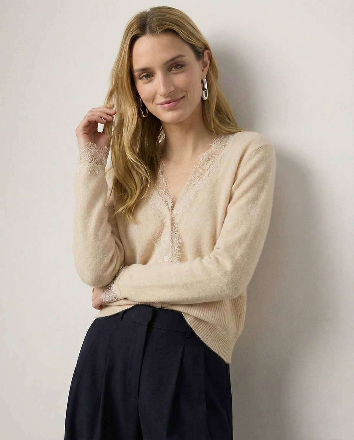 Elsa cashmere cardigan for women by Christine Brewer, soft beige knit with a relaxed fit and button-front design.