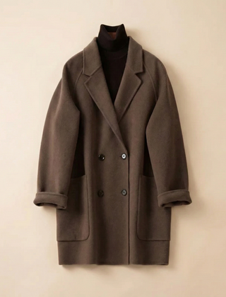 Brown double-breasted wool coat for women by Christine Brewer, featuring classic design and tailored fit.