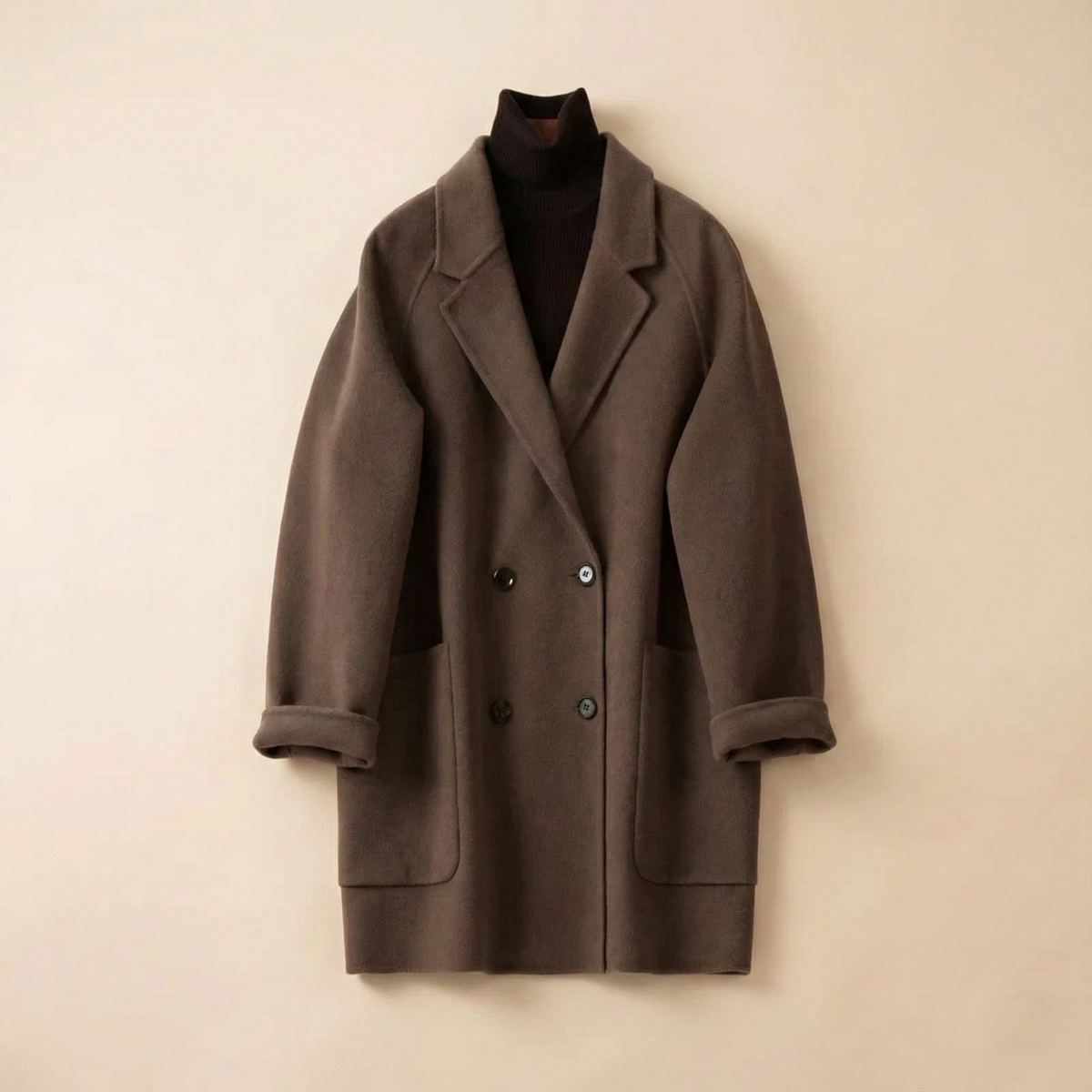 Brown double-breasted wool coat for women by Christine Brewer, featuring classic design and tailored fit.