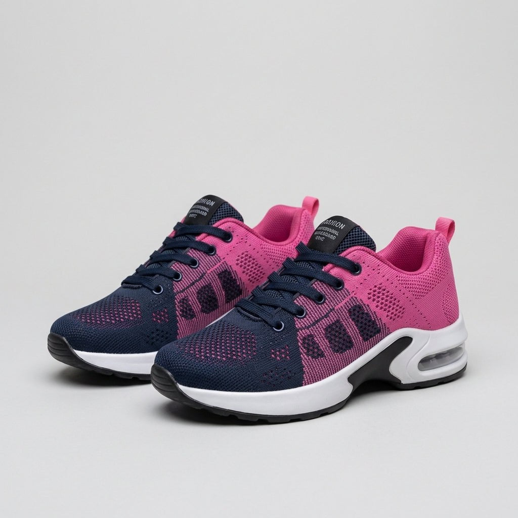 Gray knit sneakers for women by Christine Brewer, showcasing comfortable, stylish footwear with textured knit uppers.