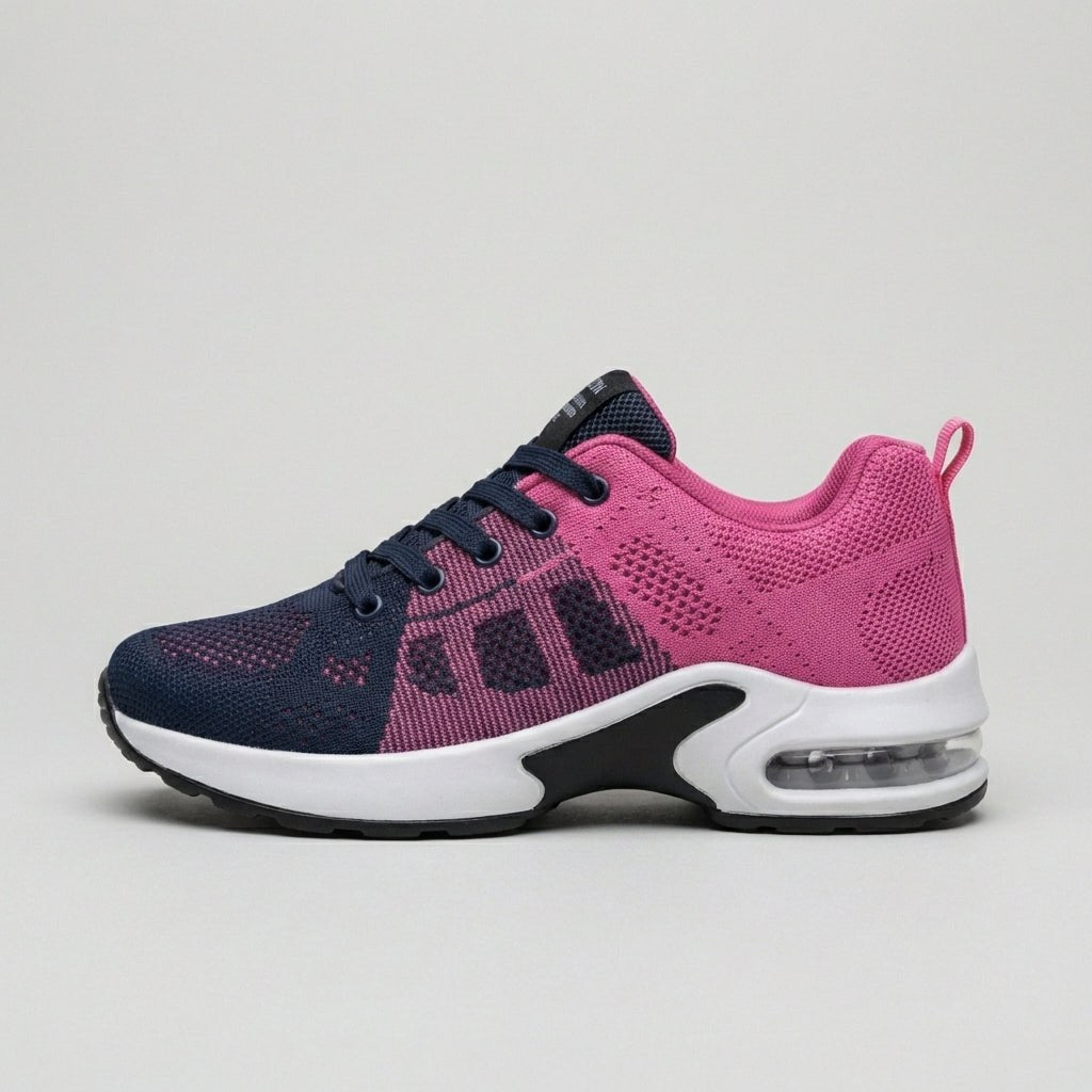 Close-up of Christine Brewer women's knit sneakers showing soft knit fabric, white soles, and stylish casual design.